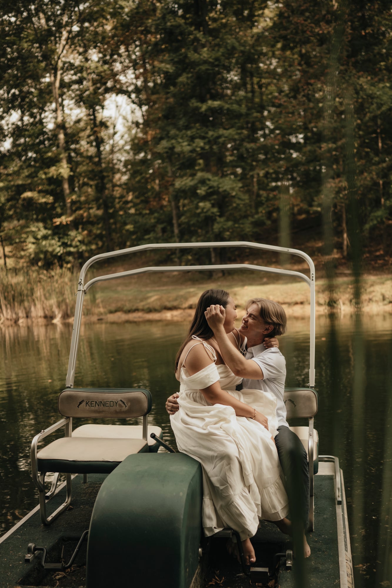 Couple on a paddle boat in the middle of the lake