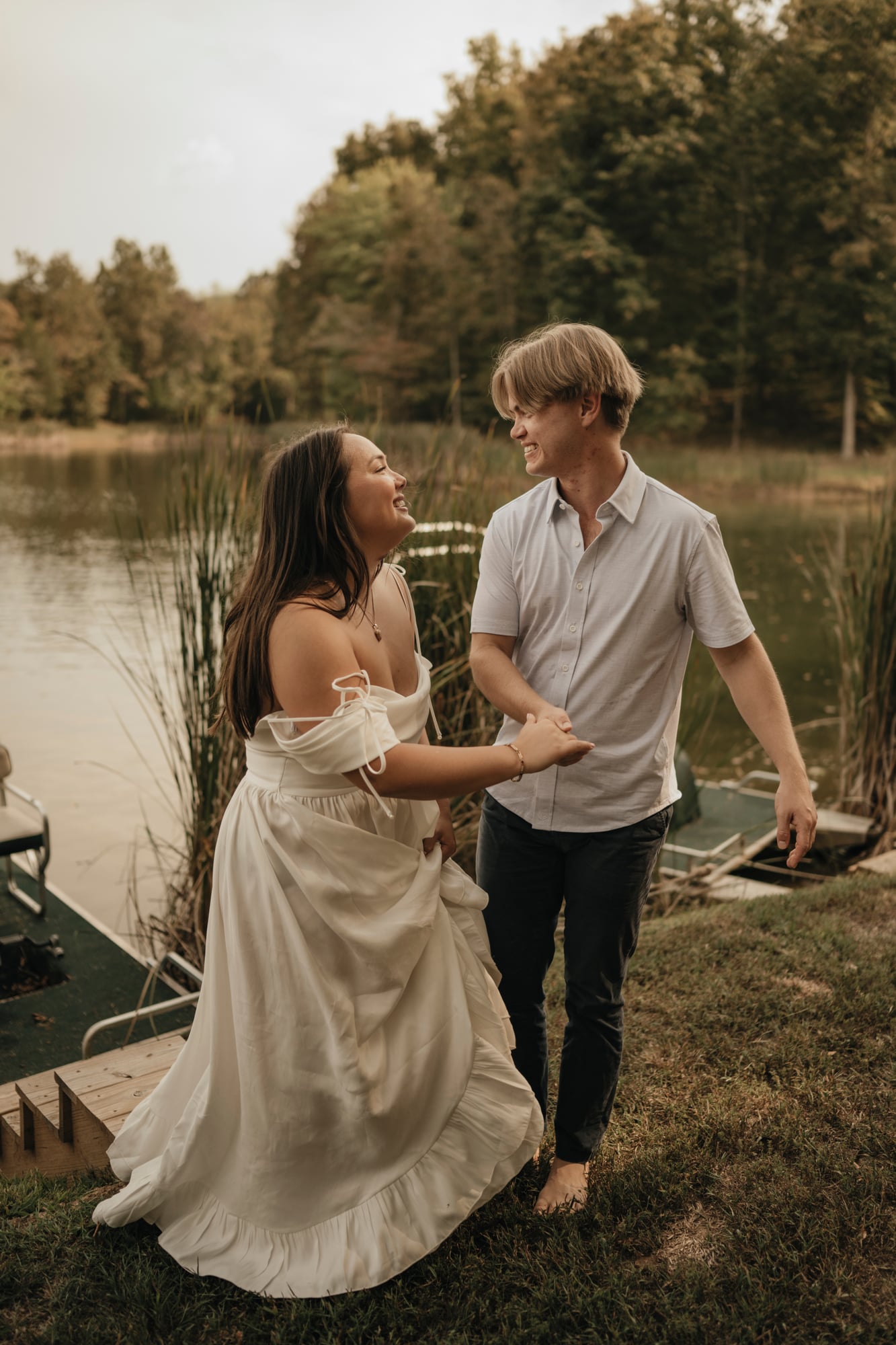 Couple sharing an intimate moment surrounded by trees