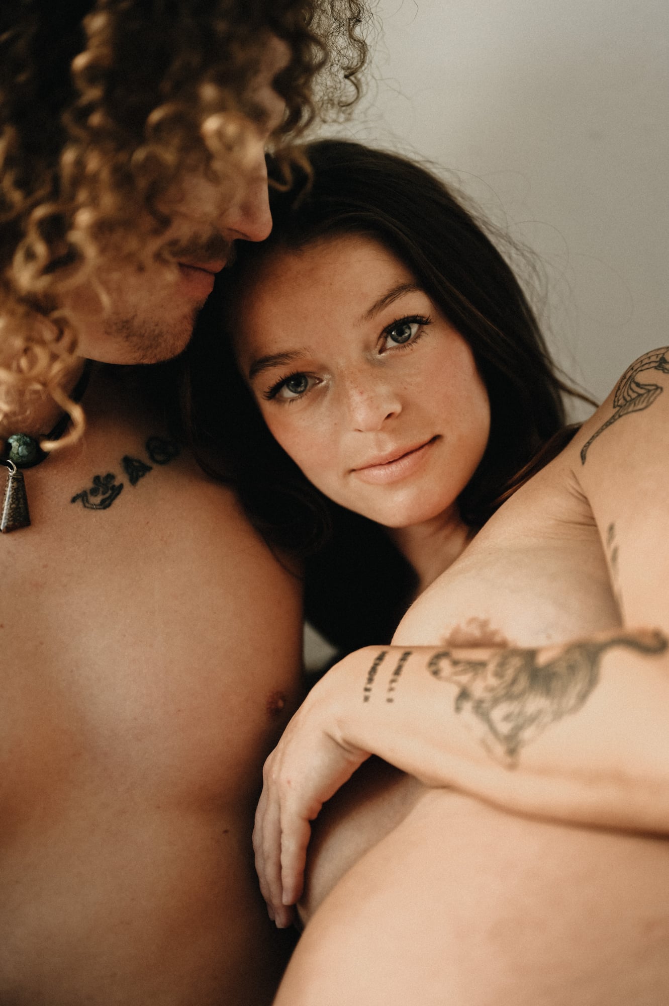 Close portrait of a couple in warm natural light